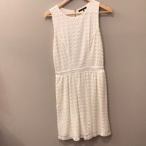 White Sleeveless Dress with Flower Detail